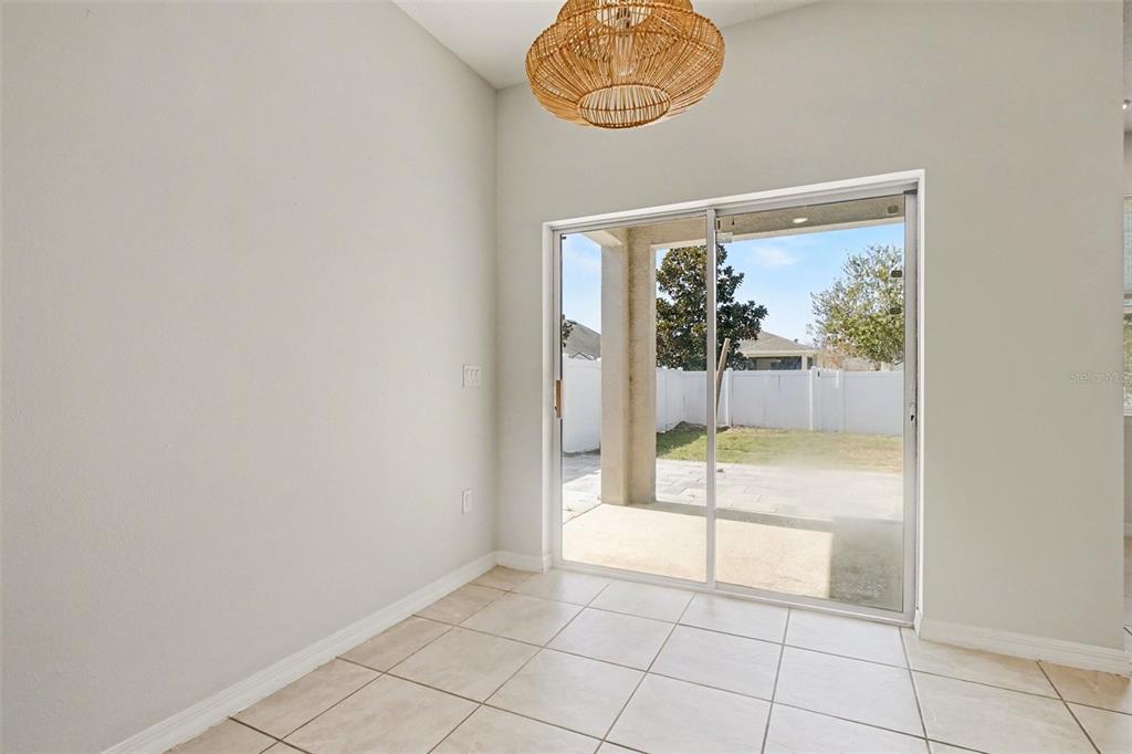 2735 Rowan Street Tavares, FL 32778 - Photo 5 of 32 a view of an empty room with a window