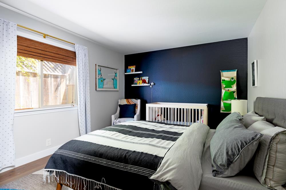 220 Aptos Beach Drive Aptos, CA 95003 - Photo 12 of 21 a bedroom with a bed and a window