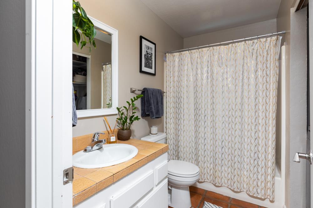 220 Aptos Beach Drive Aptos, CA 95003 - Photo 13 of 21 a bathroom with a sink toilet and shower