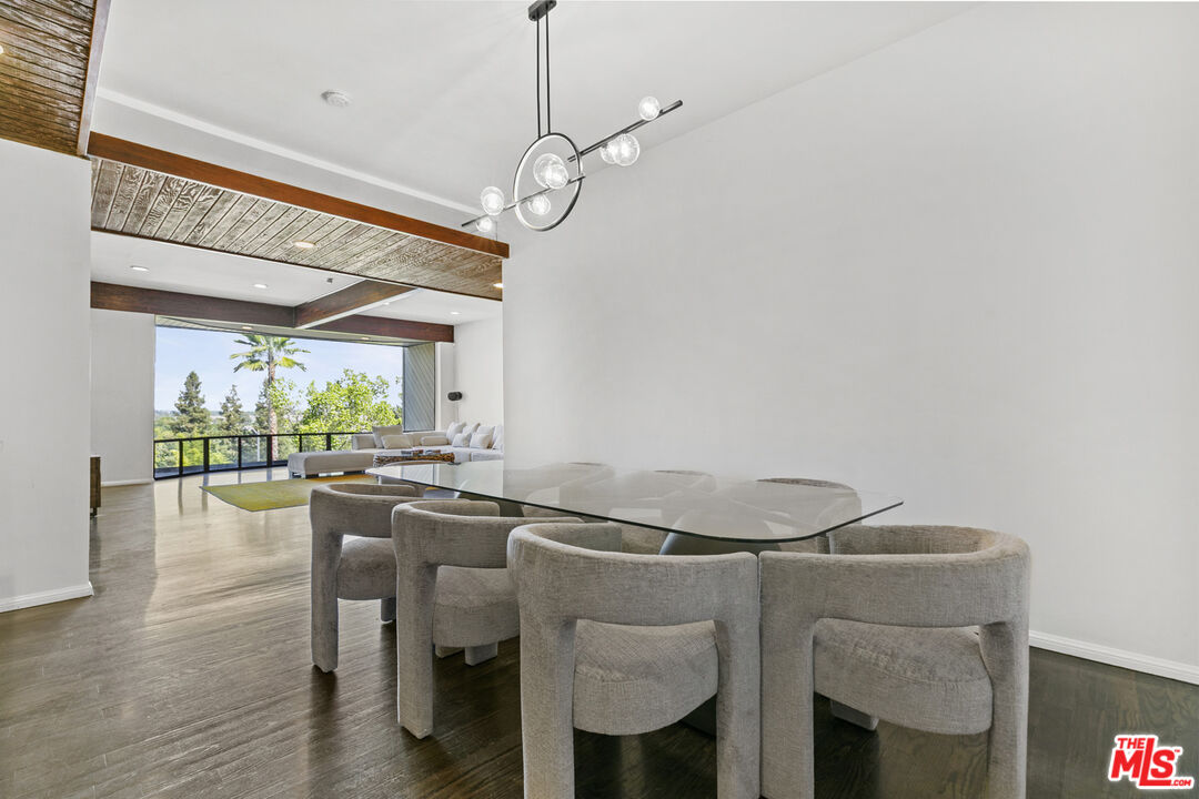 13952 Valley Vista Boulevard Sherman Oaks, CA 91423 - Photo 15 of 44 a room with chairs and window