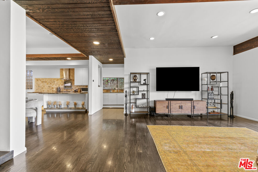 13952 Valley Vista Boulevard Sherman Oaks, CA 91423 - Photo 18 of 44 a living room with furniture and a flat screen tv