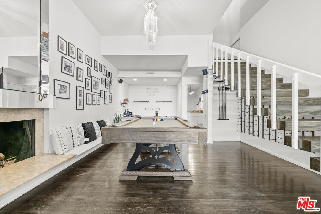 13952 Valley Vista Boulevard Sherman Oaks, CA 91423 - Photo 25 of 44 a living room with furniture and a fireplace