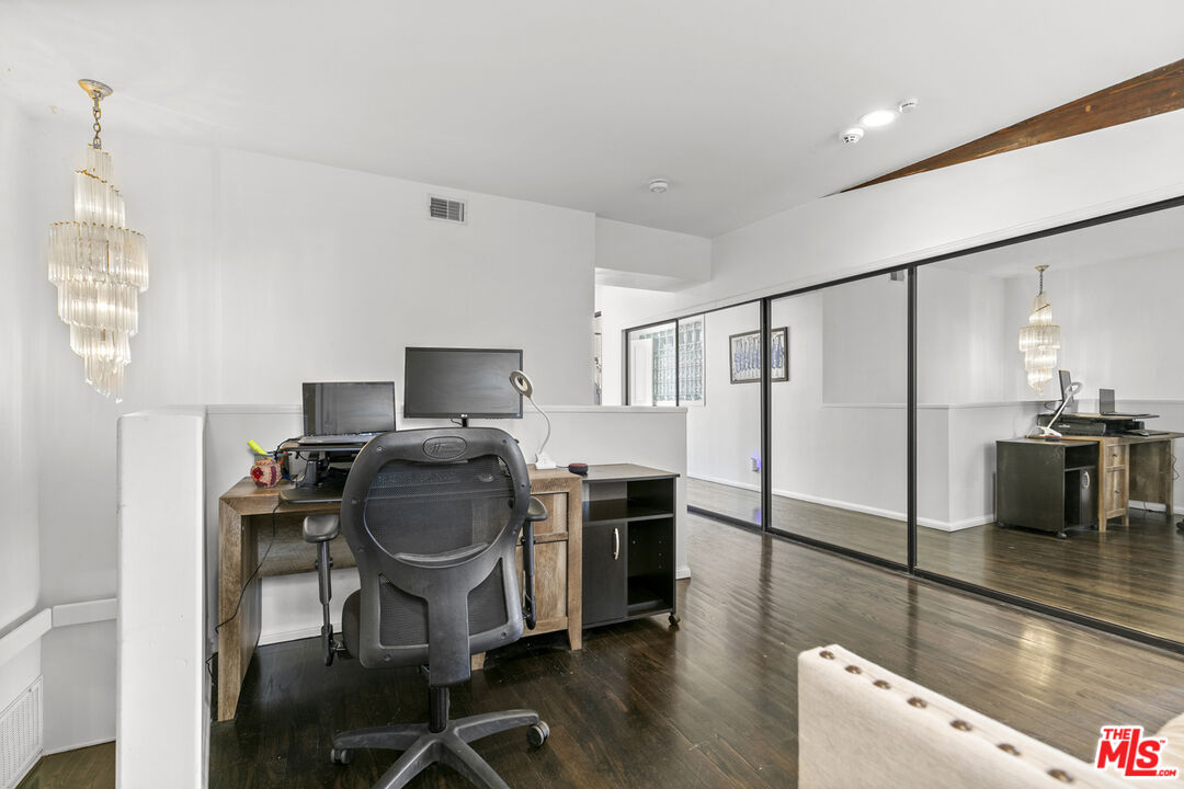 13952 Valley Vista Boulevard Sherman Oaks, CA 91423 - Photo 40 of 44 a workspace with furniture and wooden floor