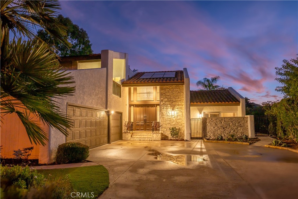 3563 Twin Lake Westlake Village, CA 91361 - Photo 11 of 54 a view of a house with a yard