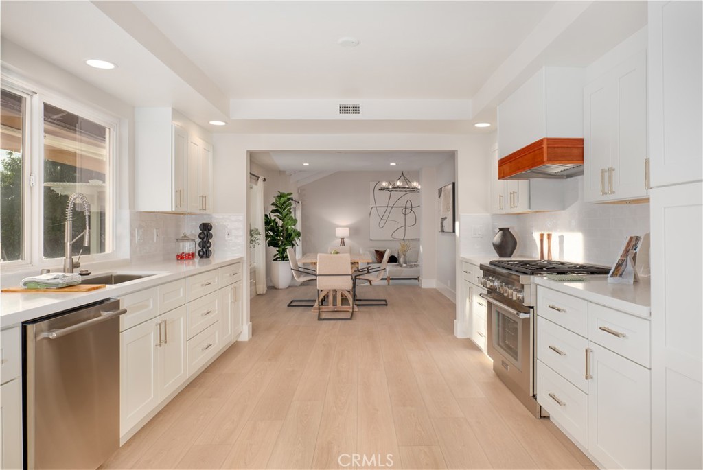 3563 Twin Lake Westlake Village, CA 91361 - Photo 17 of 54 a large kitchen with cabinets a sink and appliances