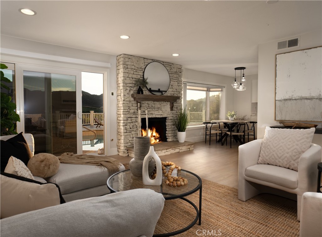 3563 Twin Lake Westlake Village, CA 91361 - Photo 20 of 54 a living room with furniture and a fireplace