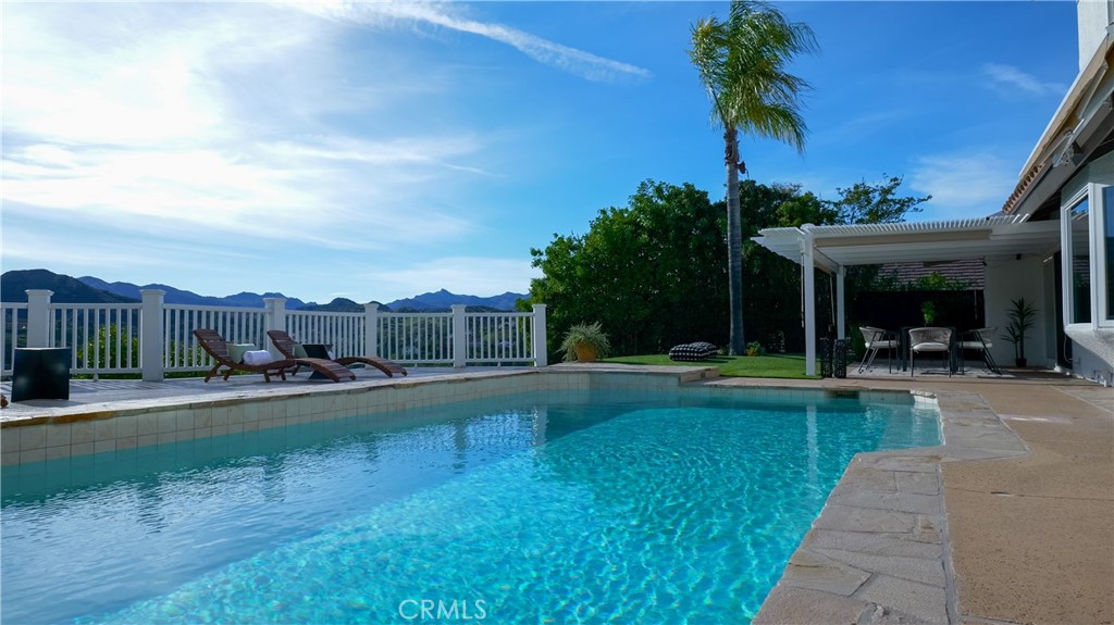 3563 Twin Lake Westlake Village, CA 91361 - Photo 27 of 54 a view of a house with backyard and sitting area