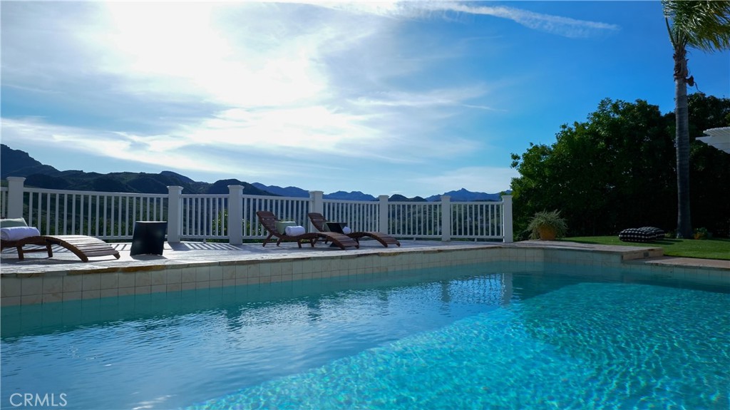3563 Twin Lake Westlake Village, CA 91361 - Photo 28 of 54 a view of a swimming pool and a yard