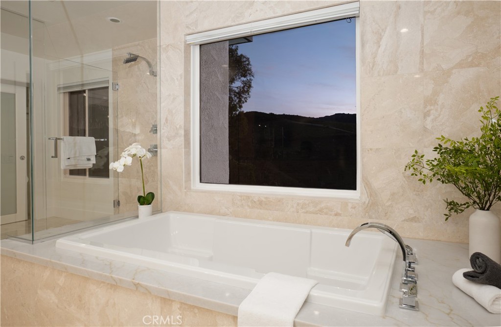 3563 Twin Lake Westlake Village, CA 91361 - Photo 46 of 54 a bathroom with a bathtub and a shower