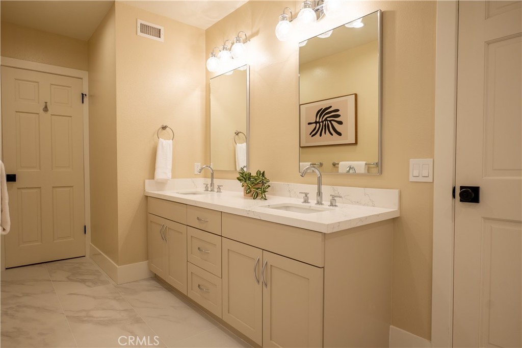 3563 Twin Lake Westlake Village, CA 91361 - Photo 49 of 54 a bathroom with a sink and a mirror