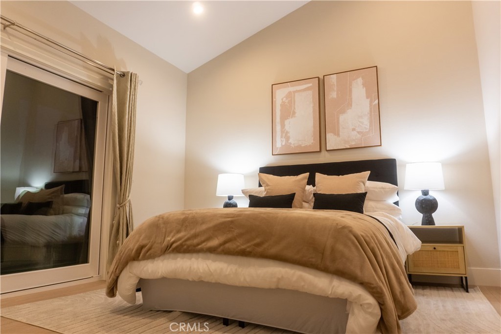 3563 Twin Lake Westlake Village, CA 91361 - Photo 52 of 54 a bedroom with a bed and a mirror