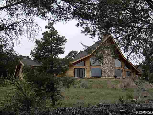 1850 Harte Road Reno, NV 89521 - Photo 1 of 9 a view of a house with a yard