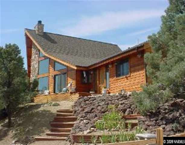 1850 Harte Road Reno, NV 89521 - Photo 2 of 9 a front view of a house with a yard
