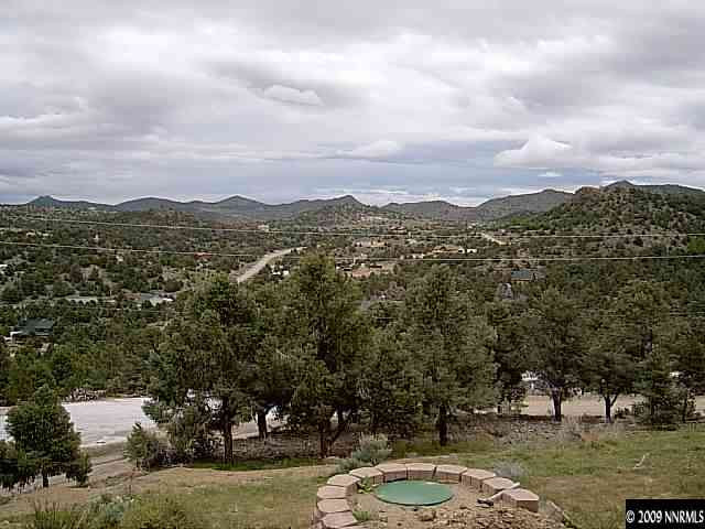 1850 Harte Road Reno, NV 89521 - Photo 9 of 9 a view of a town with mountains in the background