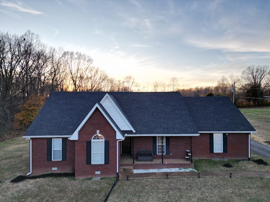 1714 West Grab Creek Road Dickson, TN 37055 - Photo 1 of 26 a front view of a house with a garden