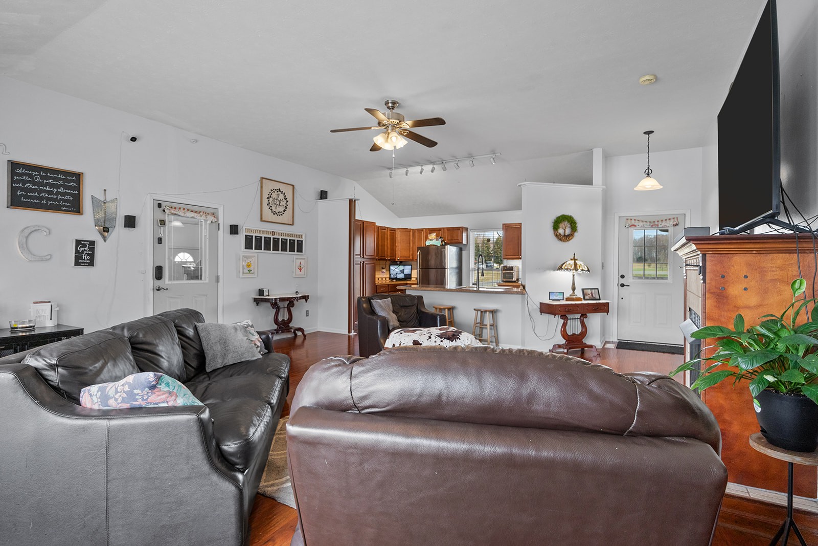 1714 West Grab Creek Road Dickson, TN 37055 - Photo 11 of 26 a living room with furniture and a flat screen tv