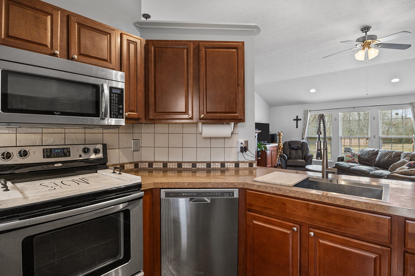 1714 West Grab Creek Road Dickson, TN 37055 - Photo 13 of 26 a kitchen with a stove microwave and sink