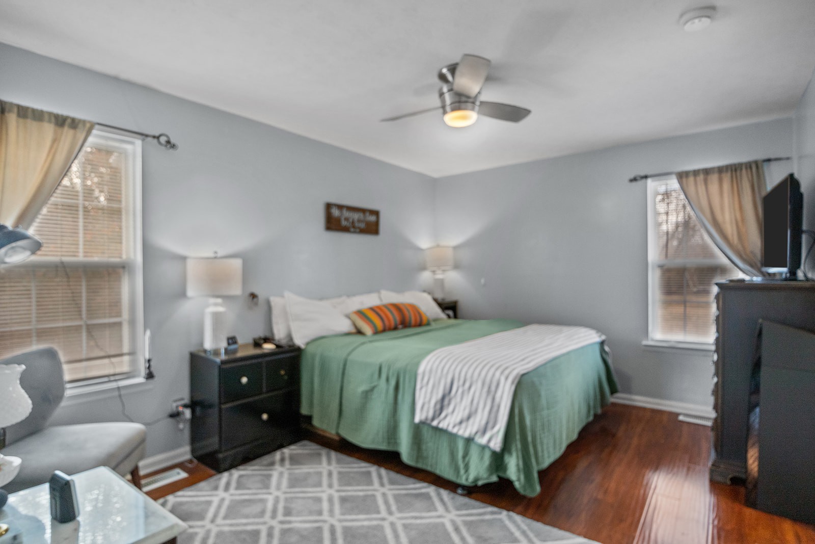 1714 West Grab Creek Road Dickson, TN 37055 - Photo 15 of 26 a bedroom with a bed and wooden floor
