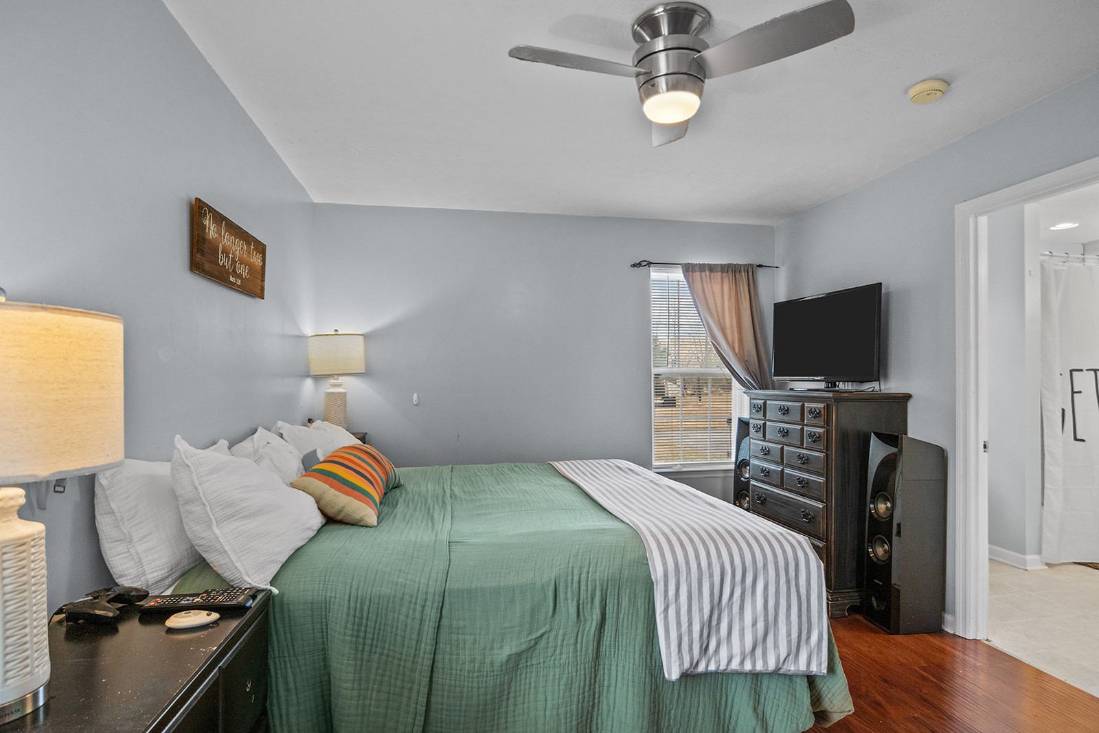 1714 West Grab Creek Road Dickson, TN 37055 - Photo 16 of 26 a bedroom with a bed and a flat screen tv