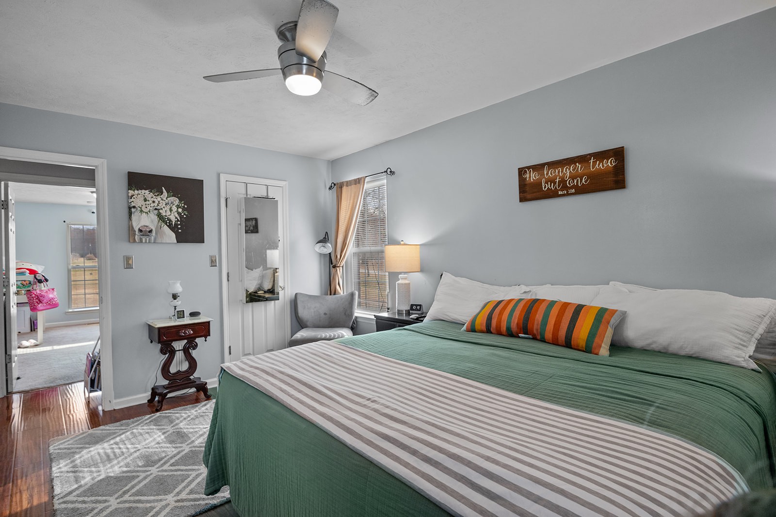 1714 West Grab Creek Road Dickson, TN 37055 - Photo 17 of 26 a bedroom with a bed and a chandelier