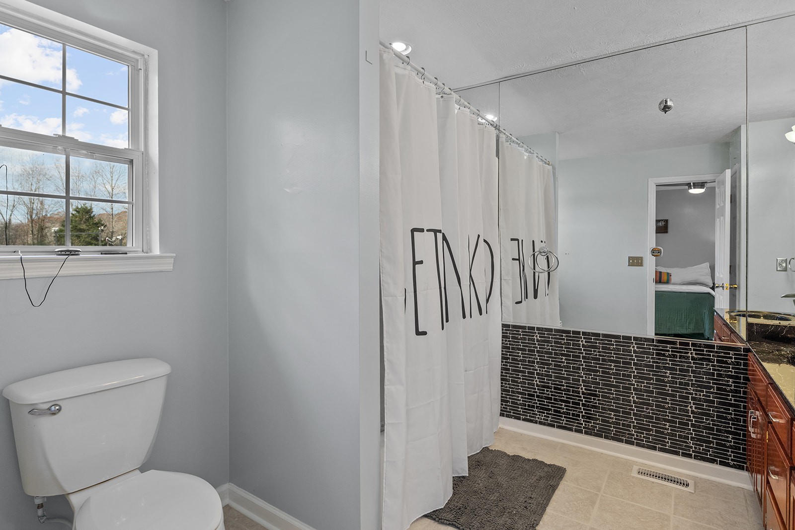 1714 West Grab Creek Road Dickson, TN 37055 - Photo 19 of 26 a bathroom with a toilet and a shower