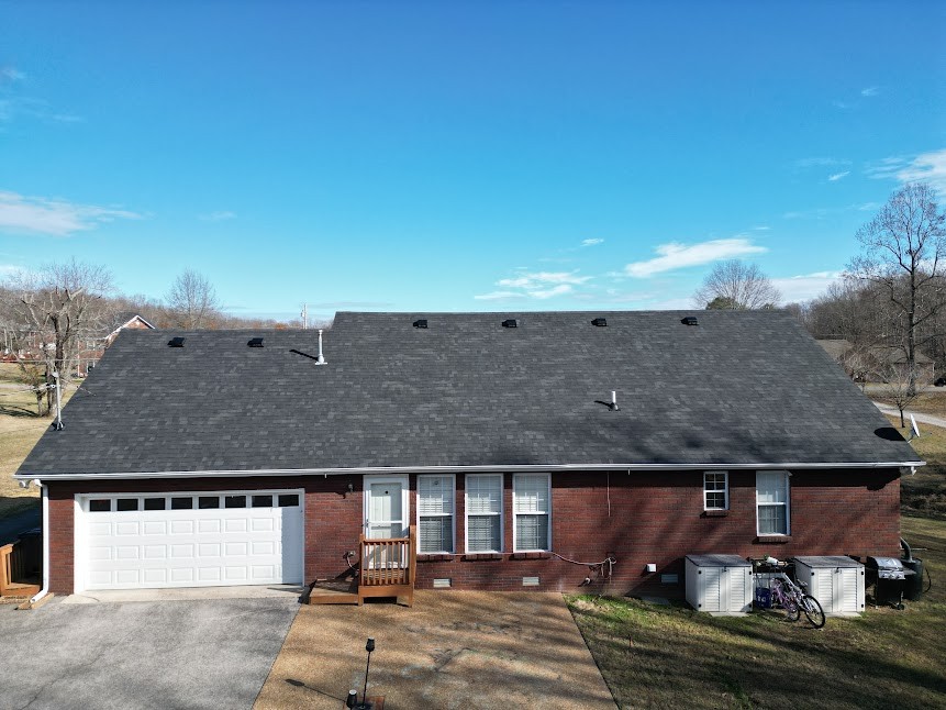 1714 West Grab Creek Road Dickson, TN 37055 - Photo 2 of 26 an aerial view of a house with a yard