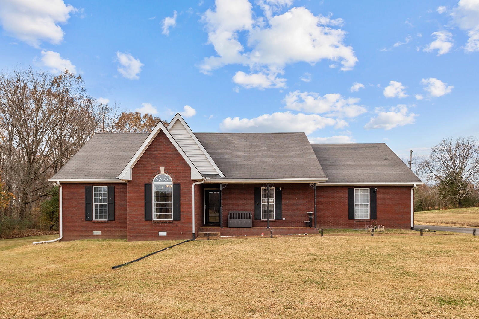 1714 West Grab Creek Road Dickson, TN 37055 - Photo 3 of 26 a front view of a house with yard