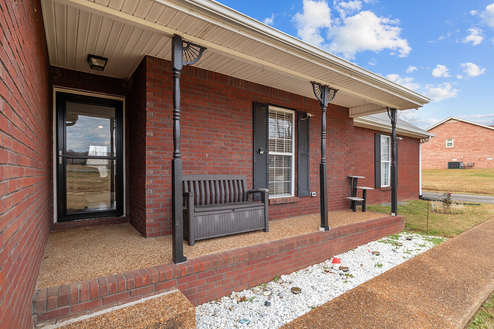 1714 West Grab Creek Road Dickson, TN 37055 - Photo 5 of 26 a view of a porch with a table and chairs
