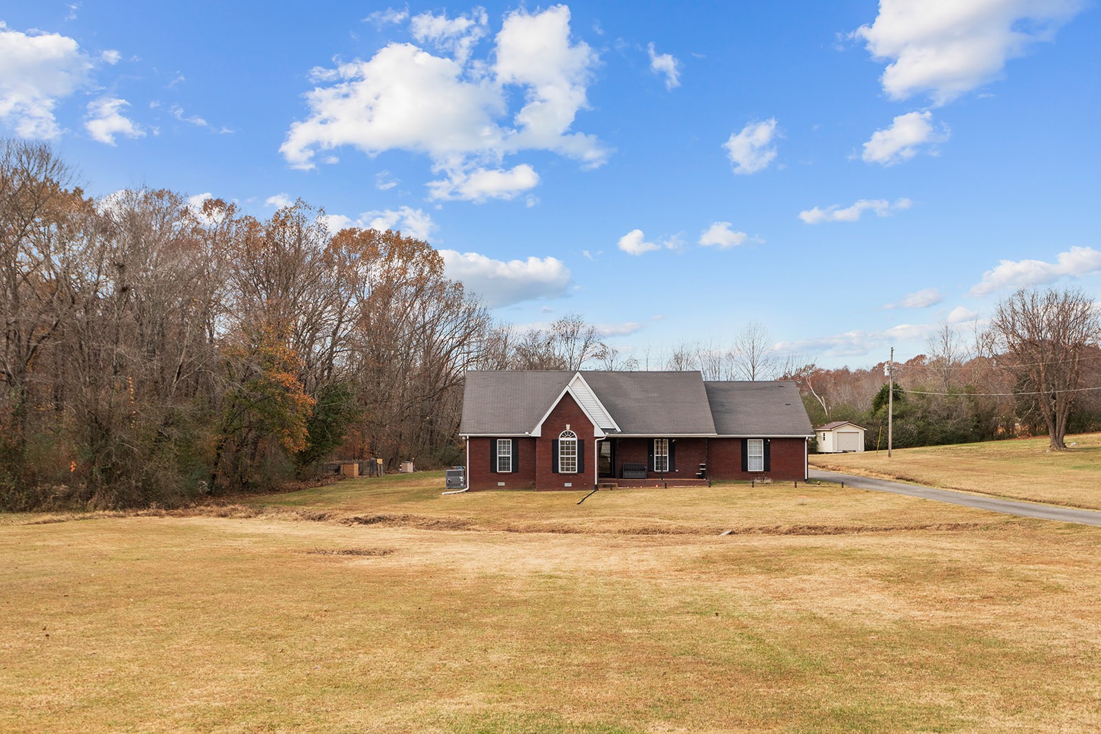 1714 West Grab Creek Road Dickson, TN 37055 - Photo 6 of 26 a view of a house with a yard