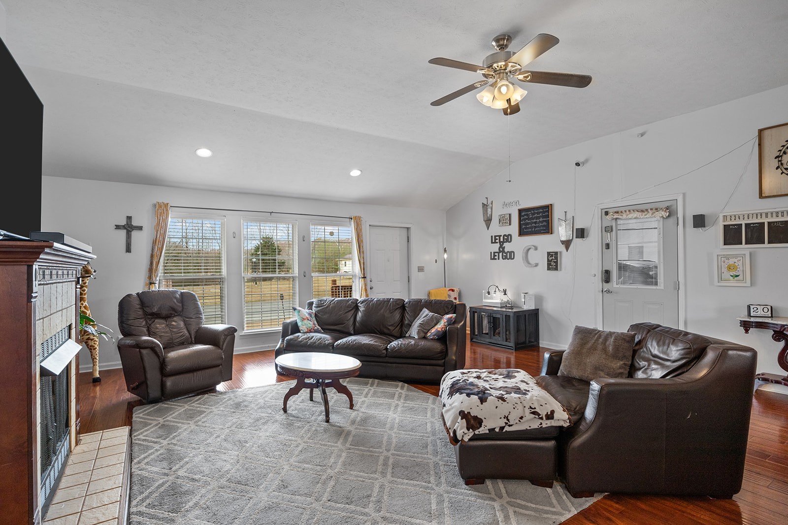 1714 West Grab Creek Road Dickson, TN 37055 - Photo 8 of 26 a living room with furniture ceiling fan and a window