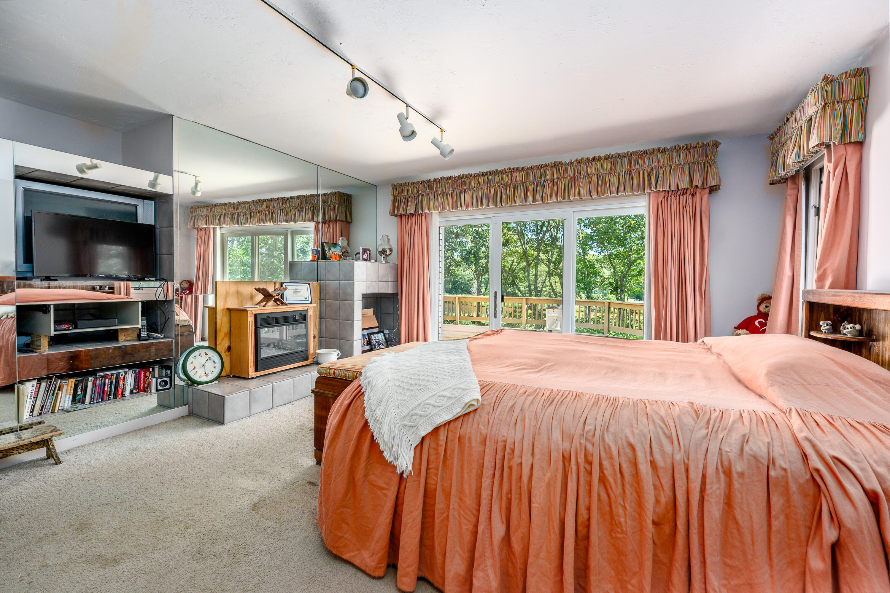 108 Waterside Drive Centerville, MA 02632 - Photo 34 of 64 a bed room with a bed and a television