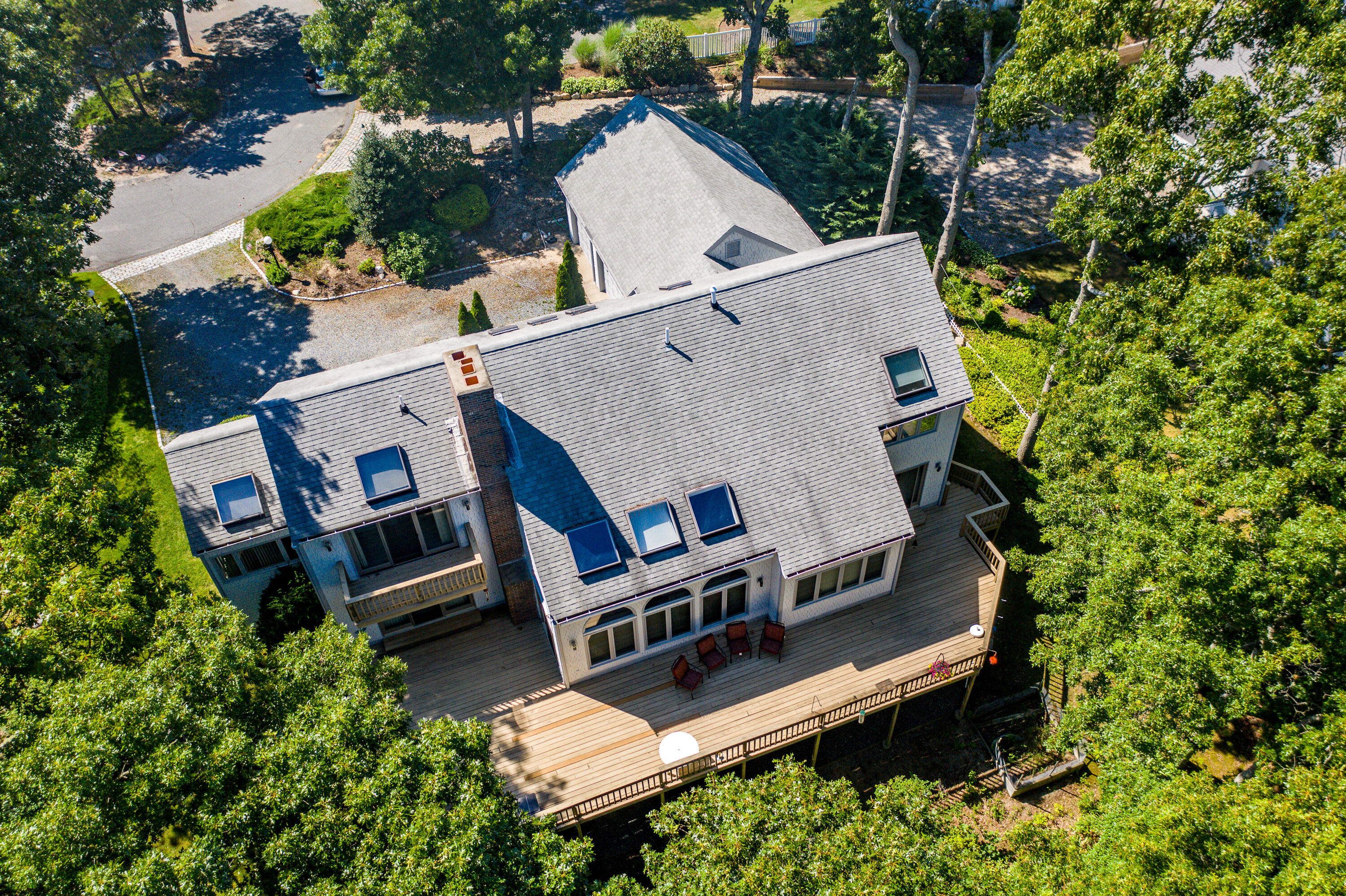 108 Waterside Drive Centerville, MA 02632 - Photo 58 of 64 an aerial view of a house with roof deck and sitting area