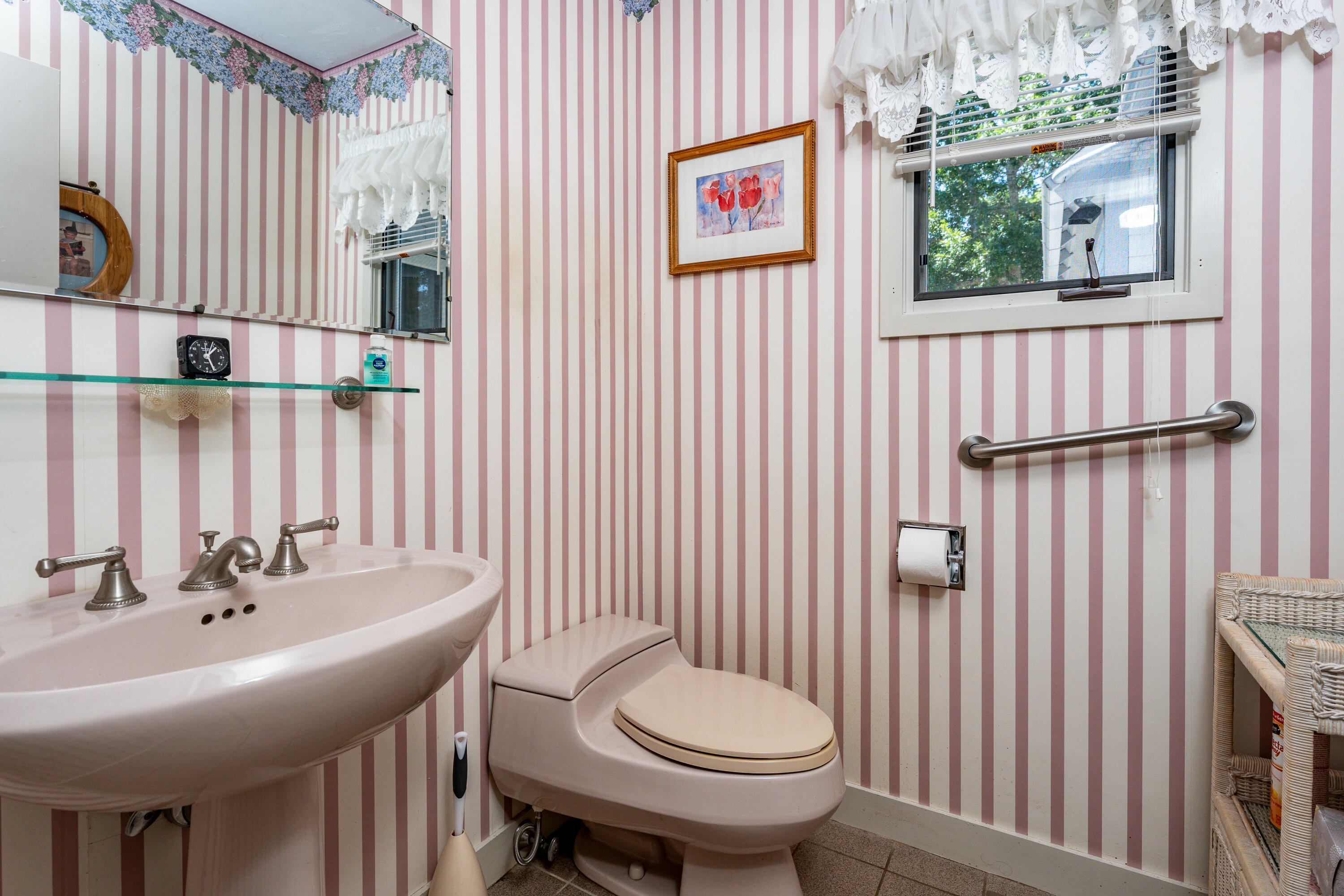 108 Waterside Drive Centerville, MA 02632 - Photo 63 of 64 a bathroom with a sink a toilet and mirror