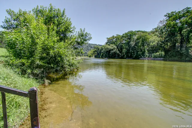 a view of a swimming pool with a chair