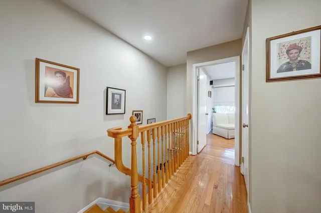 a view of a hallway with a room