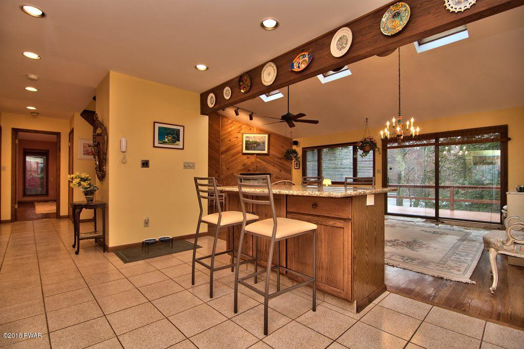 3042 Northgate Road Lake Ariel, PA 18436 - Photo 35 of 37 a view of a dining room with furniture and chandelier