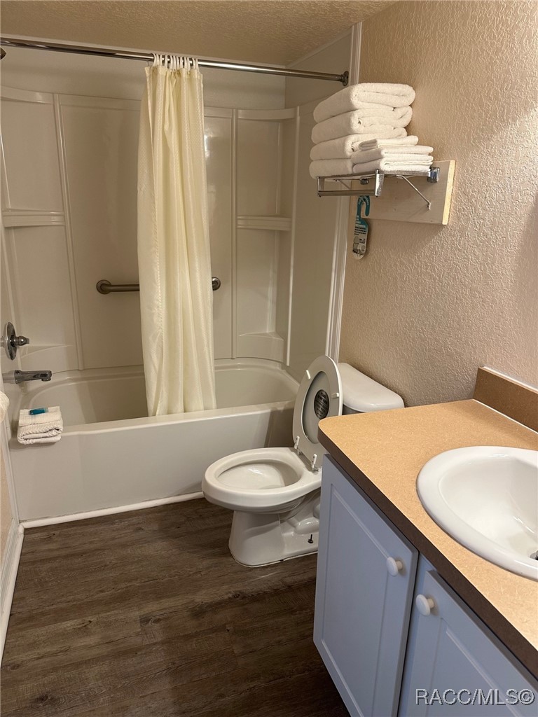 5291 South Cherokee Way Homosassa, FL 34448 - Photo 15 of 27 a bathroom with a sink a toilet and shower