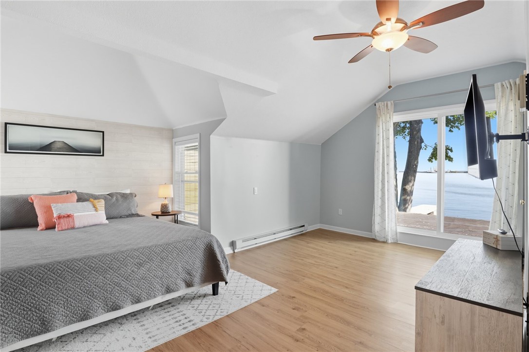 8593 Greig Street Sodus, NY 14555 - Photo 24 of 43 Primary bedroom with ensuite and sliding glass doo