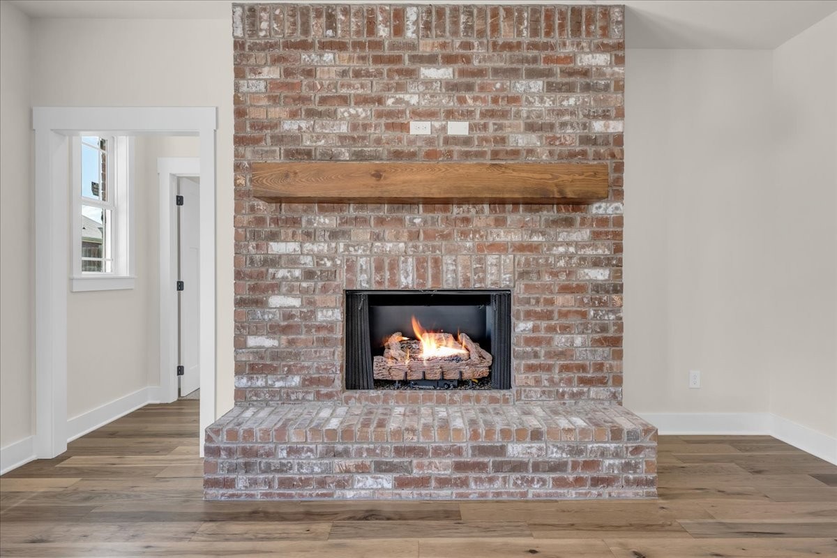 112 Riley Creek Road Tullahoma, TN 37388 - Photo 23 of 54 a stone house with a fireplace
