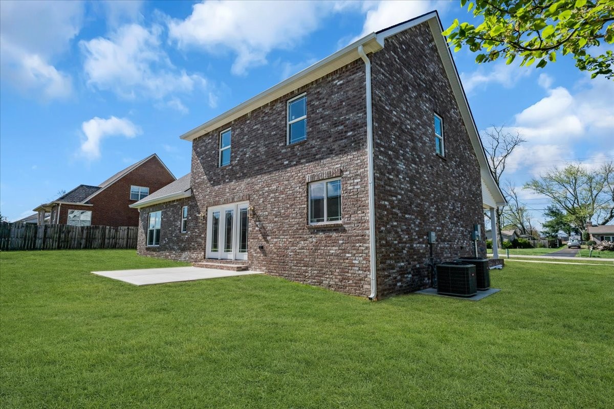 112 Riley Creek Road Tullahoma, TN 37388 - Photo 39 of 54 a front view of a house with a yard and trees