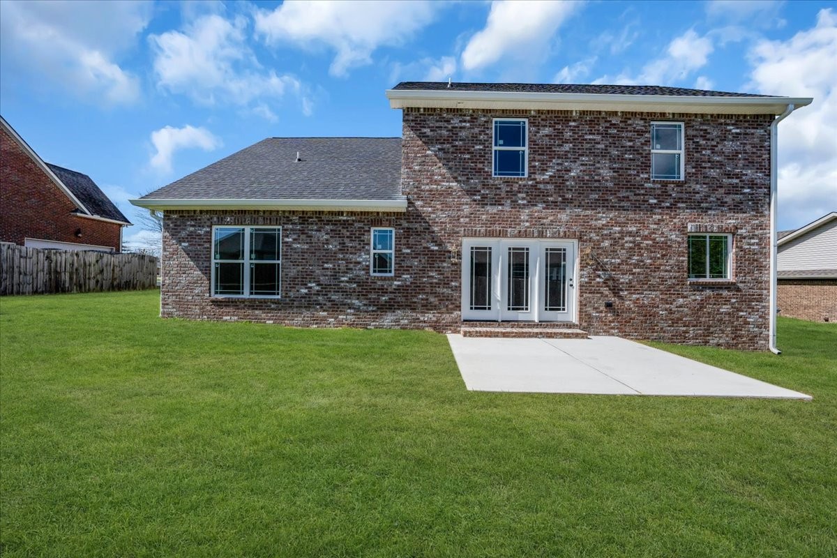 112 Riley Creek Road Tullahoma, TN 37388 - Photo 41 of 54 a front view of a house with a garden and yard