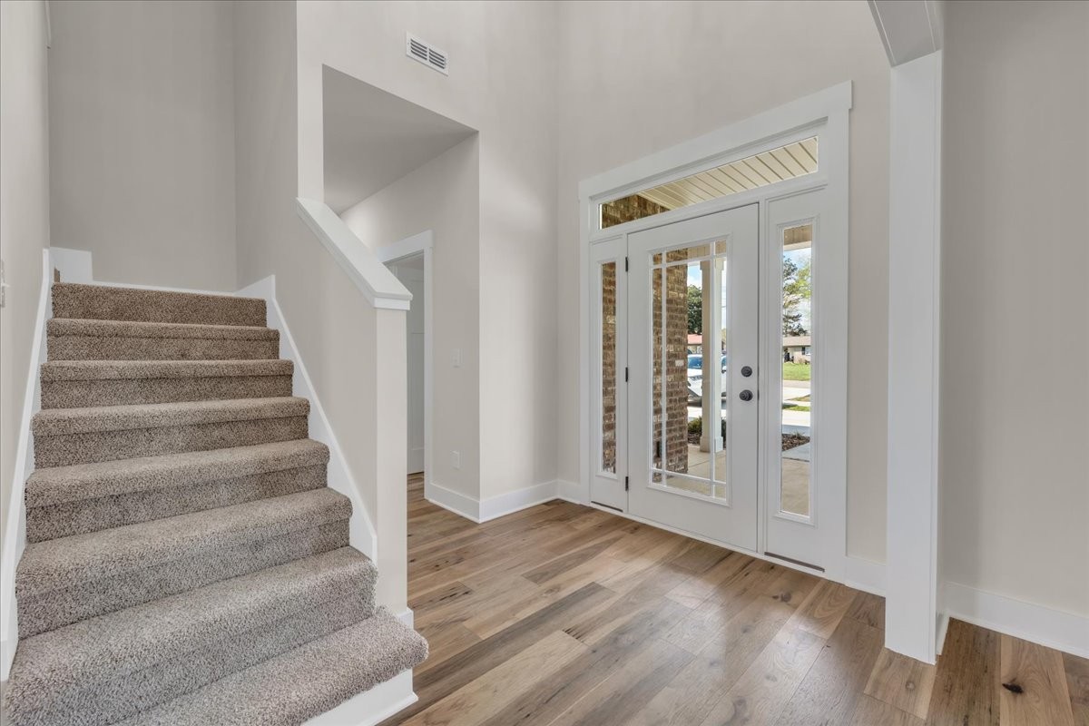 112 Riley Creek Road Tullahoma, TN 37388 - Photo 5 of 54 a view of an entryway with wooden floor and door
