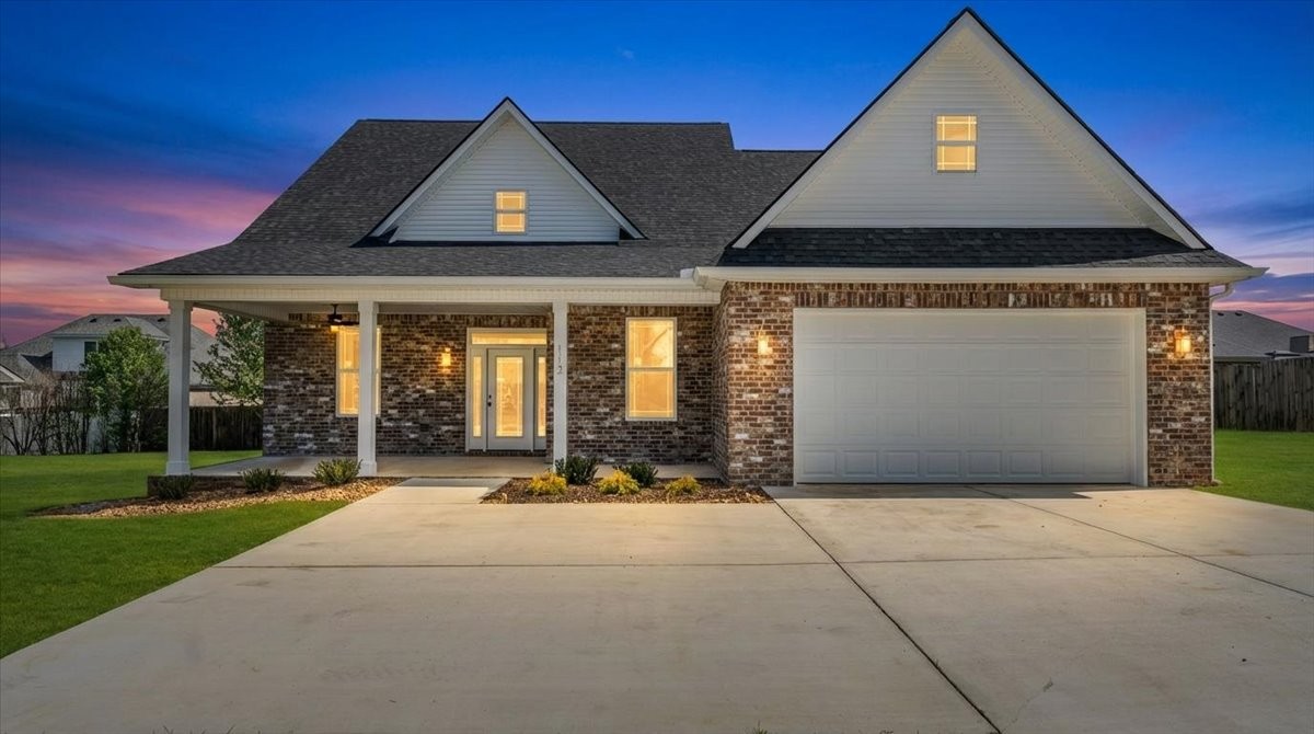 112 Riley Creek Road Tullahoma, TN 37388 - Photo 51 of 54 a front view of house with yard and green space