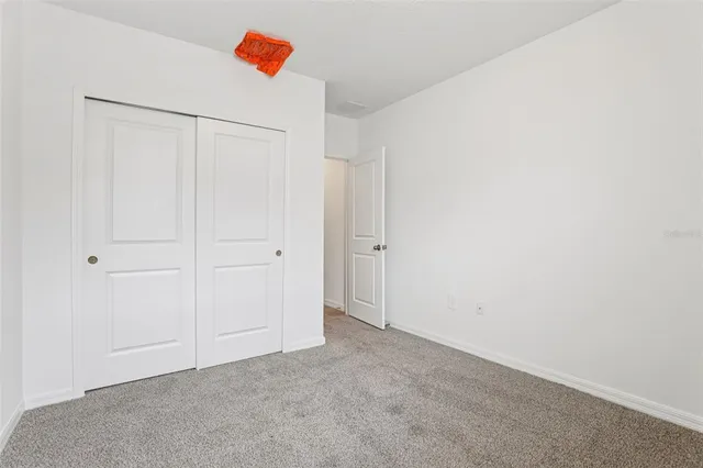 a view of a house with a big yard