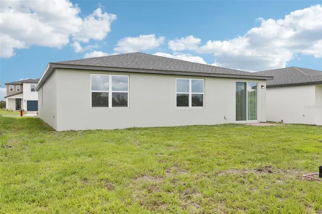 a house view with a garden space