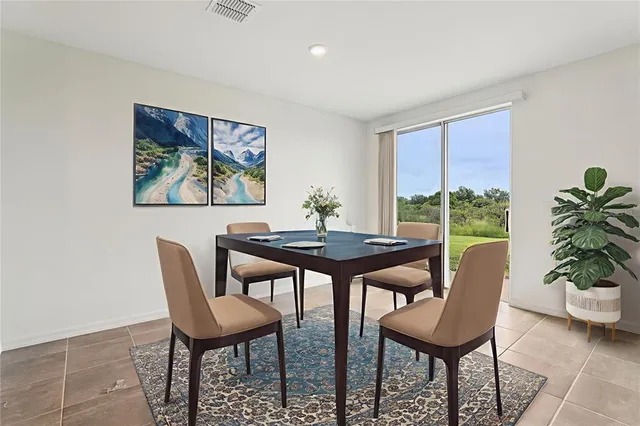 a view of a livingroom with furniture and a table