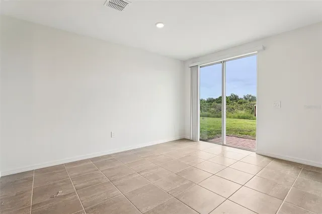 a view of an empty room with window