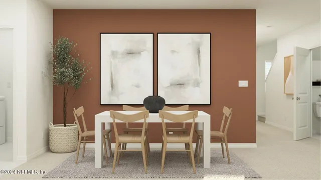 a kitchen with a dining table and chairs