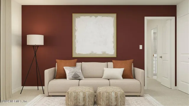 a bedroom with a bed and a night stand