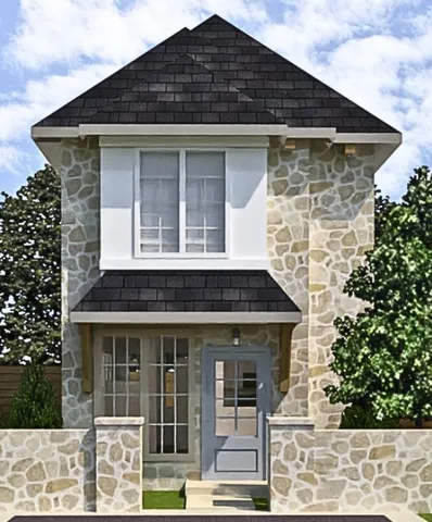 a front view of a house with a garden